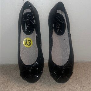 Shiny Black Flats with Bow Accent